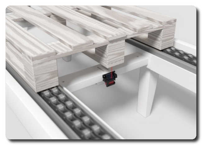 Innovative, factory integration of the special mounting bracket with sensor for pallet detection in the inner area of the conveyor.