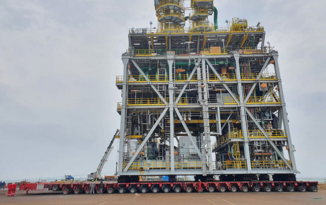 Mammoet teams use trailers for 2,200t module load-out. 