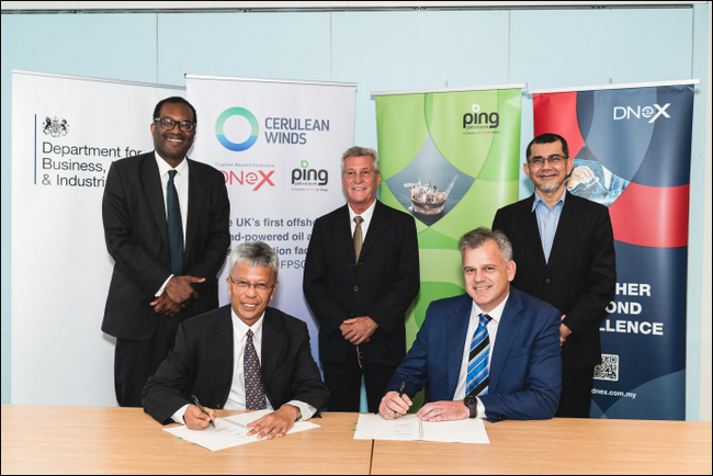 Secretary of State Kwasi Kwarteng observes the signing between Zainal Abidin Abd Jalil and Rob Fisher of Ping Petroleum, Dan Jackson of Cerulean Winds and Tan Sri Syed Zainal Abidin Syed Mohamed Tahir of DNeX